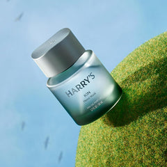 Harry's Kin base notes image shows cedarwood and cashmere depth.