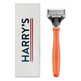 Harry's Truman handle close-up showing textured grip for precise control.