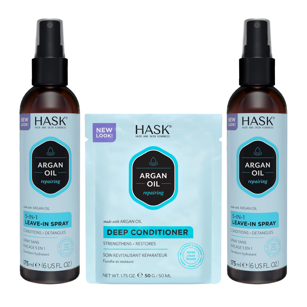 HASK Argan Oil 5-in-1 Leave-In Spray bottle on counter for detangling and shine.