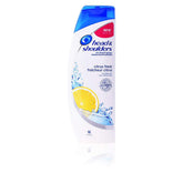 Head & Shoulders Citrus Fresh en botella, cabello hidratado y sensación fresca tras el lavado.