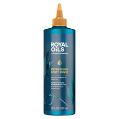 Head and Shoulders Royal Oils Root Rinse bottle on bathroom shelf for scalp refreshment