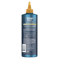 Pouring Head and Shoulders Royal Oils Root Rinse to refresh roots and remove buildup