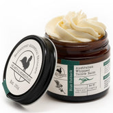 Hearth and Homestead Blue Outback Balm tin close-up shows natural texture for nourishment.