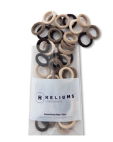 Heliums extra small hair tie in beige blonde for gentle, snag-free ponytails.