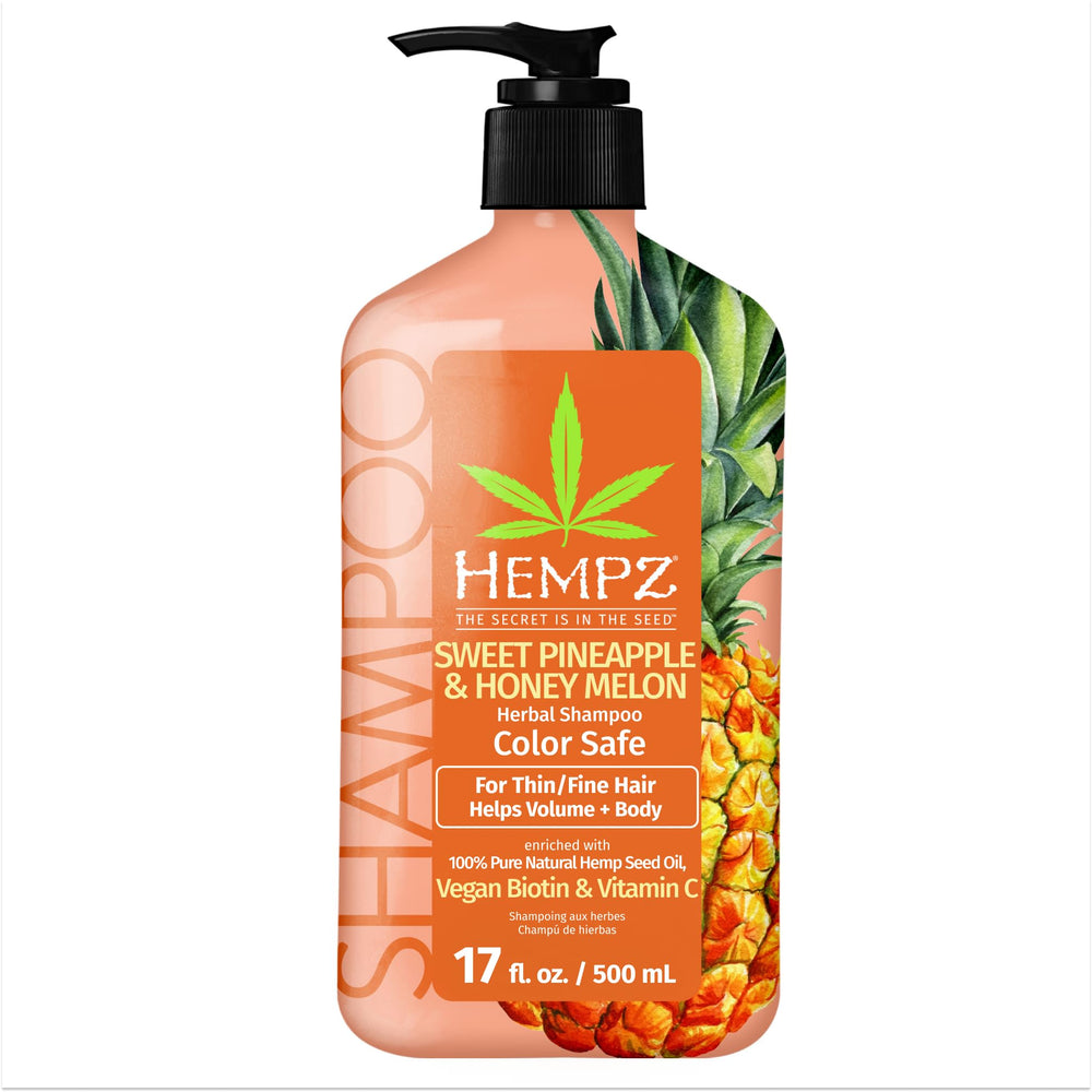 Hempz champú de biotina: botella con aroma tropical para cabello fino.