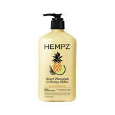 Hempz Cuerpo Loción: botella con fragancia de piña, sensación fresca.