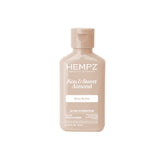 Hempz Smoothing Body Moisturizer bottle with Koa and Sweet Almond scent for daily hydration.