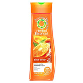 Herbal Essences Body Envy shampoo bottle tilt shows vibrant citrus scent for daily freshness