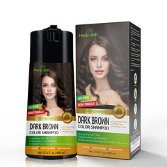 Close-up of Herbishh bottle highlighting dark brown shade and texture