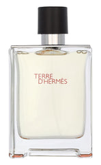 Hermès Terre d’Hermès bottle cap closeup; premium design for gifting.
