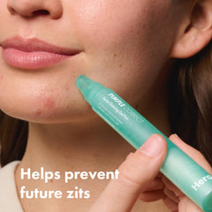 Hero Cosmetics Pimple Correct pen close-up shows gel drying on skin