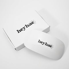 Heyhae LED lamp performing top gel cure for a glossy finish