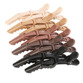 HH&LL hair clip with wide teeth and double hinge for secure alligator-style hold while styling.