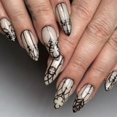 Uñas HJKDSFD en forma almendra negro gótico con brillo para look nocturno