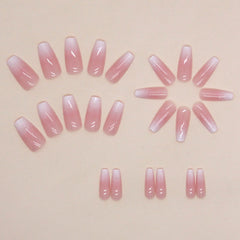 Close-up of Hkanlre coffin nails with pink gradient design