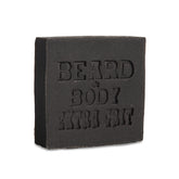 Honest Amish Beard and Body Soap Extra Grit bottle highlighting exfoliating formula for deeper cleanse
