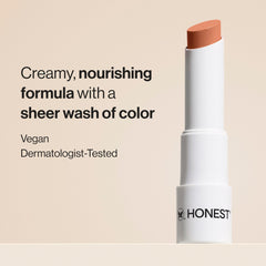 Honest Beauty Blood Orange tinted lip balm swatch with red-orange tint and moisture.