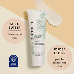 The Honest Company Hydrating Lotion label closeup showcasing natural ingredients like safflower and shea.