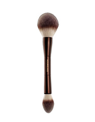 Hourglass Veil Powder brush with tapered end for precise under-eye setting