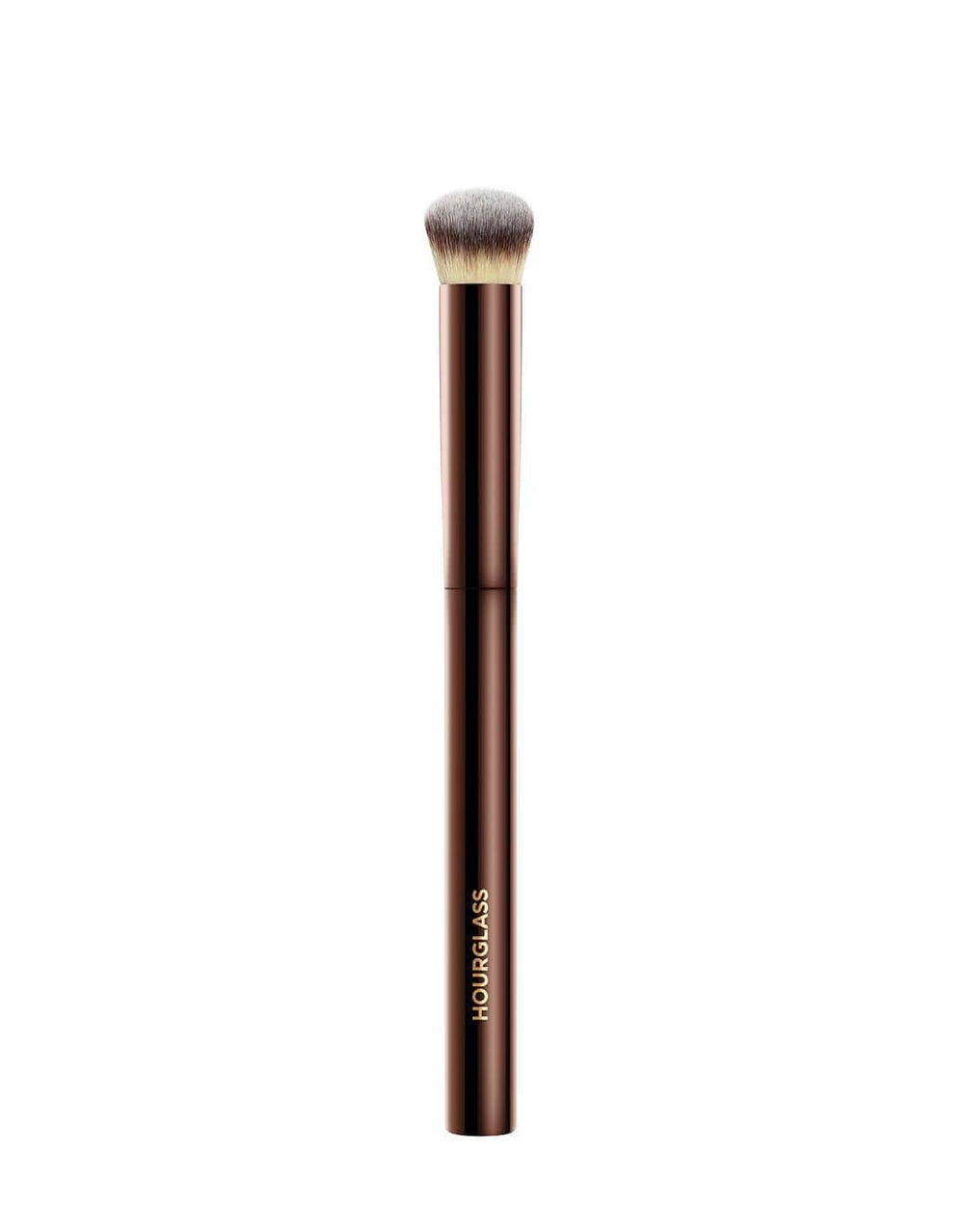 Hourglass Vanish Concealer Brush closeup shows half-moon shape for precise, seamless blending