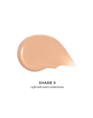 Hourglass Veil Hydrating Skin Tint swatch on skin demonstrating sheer coverage.