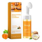HOYGI turmeric face wash with brush closeup shows gentle cleansing for all skin types.