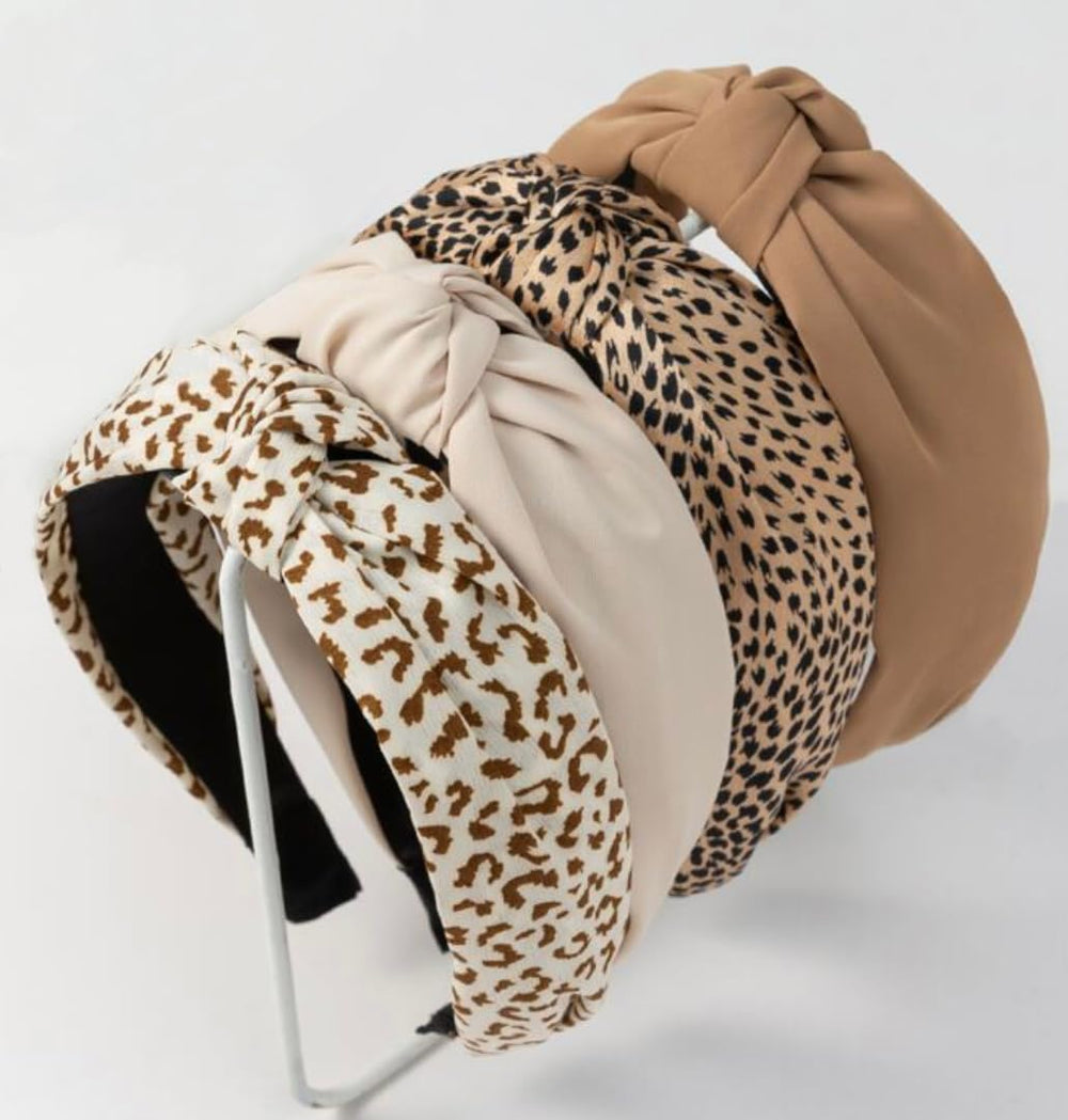 Huachi banda nudo estampado leopardo beige, mantiene el cabello fuera de la cara.