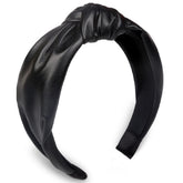 Huachi diadema nudo cuero sintético negro, fijación cómoda para uso diario.
