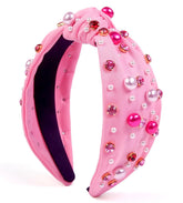 Diadema Huachi San Valentín rosa con cristales para un look deslumbrante.