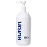 Huron Men’s Fresh Scent Daily Shampoo bottle close-up highlighting a hydrating formula.