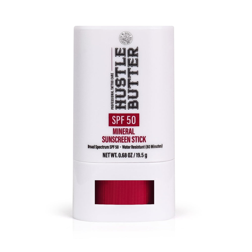 Hustle Butter Deluxe stick tatuaje protección SPF50 para aplicación rápida al aire libre.