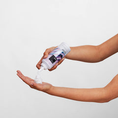 IGK Class of '93 jar close-up showing silicone-free formula for softer curls.