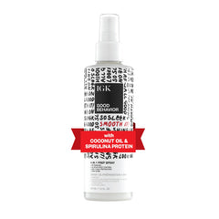 IGK Good Behavior 4-in-1 prep spray bottle ready for detangling and heat protection.