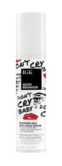 IGK Good Behavior serum bottle closeup highlighting shine and finish.