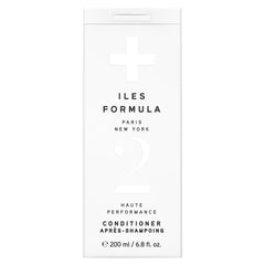 Iles Formula Paris conditioner bottle pour shows even distribution and moisture delivery
