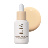 ILIA Super Serum Skin Tint bottle with dewy finish and mineral SPF.