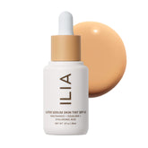 ILIA Super Serum Skin Tint SPF 40 bottle front view with dewy finish