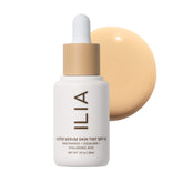 ILIA Super Serum Skin Tint SPF 40 bottle pump showing product with mineral protection benefit
