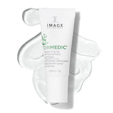 IMAGE Skincare ORMEDIC lip enhancement packaging shows premium hydration and care.