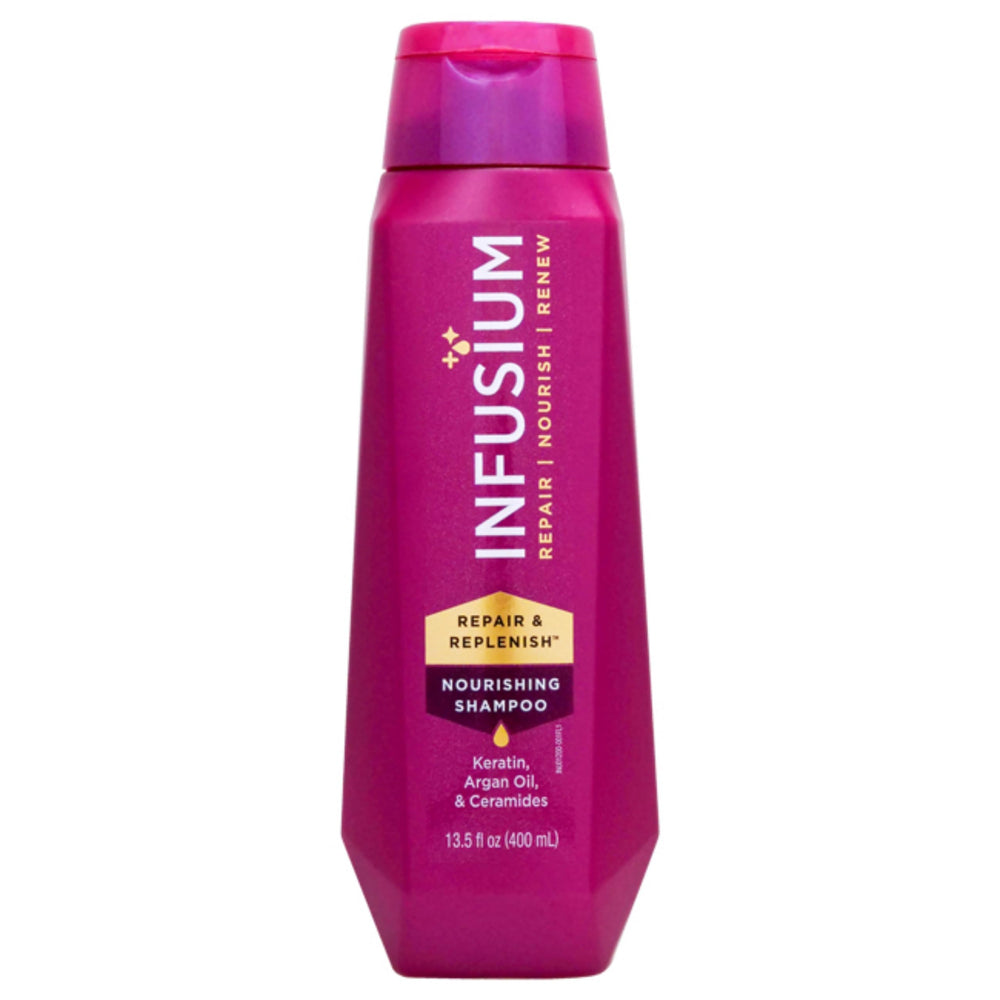 Infusium Repair and Replenish bottle pour showing a hydrating cleanse for color-treated hair