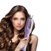 INK-EEZE automatic curling iron purple outer shell for safe, smooth curling.