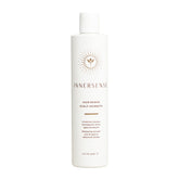 INNERSENSE Hair Renew Scalp Hairbath bottle close-up showing non-toxic, vegan care.