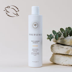 INNERSENSE creamy lather in motion illustrating lightweight, volumizing cleanse.