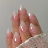IQXGE uñas acrilicas rosadas ombre almendra, diseño suave.