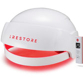 iRestore Essential cap on head for comfortable, hands-free hair regrowth.