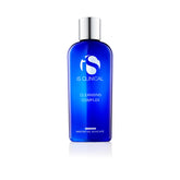 iS CLINICAL Cleansing Complex bottle dispensing rich foam for blemish-prone skin.