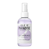 Isle of Paradise Self-Tanning Water dark mist on face and body for an even bronzed look