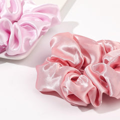 Ivyu thick hair-friendly scrunchie wrapped around a ponytail.