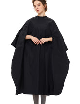Izzycka professional barber cape with armholes offering hands-free comfort during services