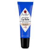 Bálsamo labial Jack Black Terapia Intensa SPF 25 en empaque compacto para viajar.